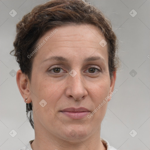 Joyful white adult female with short  brown hair and grey eyes