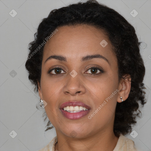 Joyful black young-adult female with medium  brown hair and brown eyes