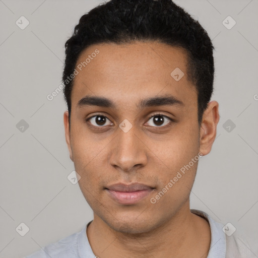 Neutral latino young-adult male with short  black hair and brown eyes