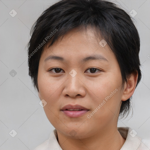 Joyful asian young-adult female with medium  brown hair and brown eyes