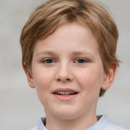 Joyful white child female with short  brown hair and brown eyes