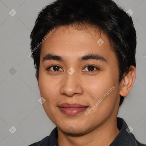 Joyful asian young-adult male with short  black hair and brown eyes