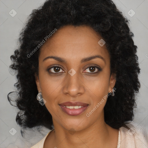 Joyful black young-adult female with long  brown hair and brown eyes