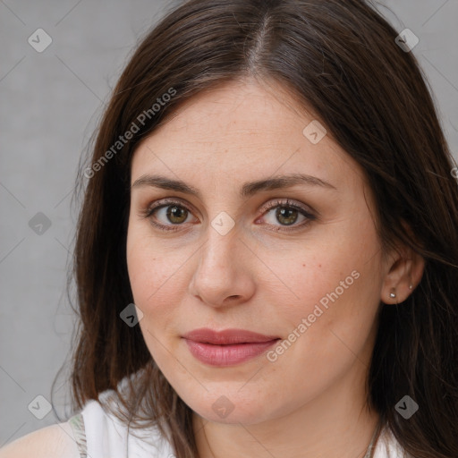 Joyful white young-adult female with medium  brown hair and brown eyes