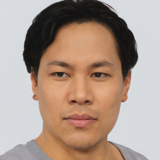 Neutral asian young-adult male with short  black hair and brown eyes
