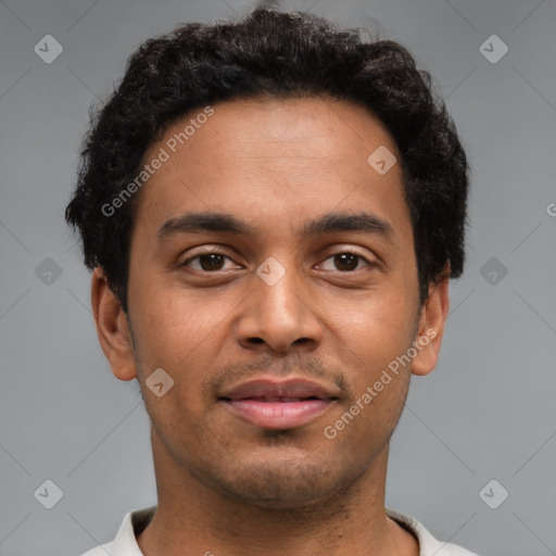 Joyful latino young-adult male with short  brown hair and brown eyes