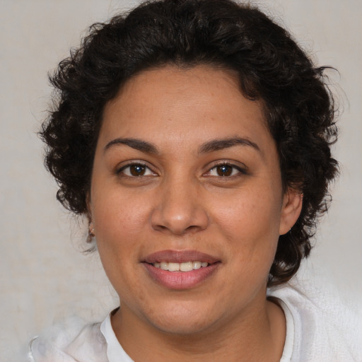 Joyful white young-adult female with medium  brown hair and brown eyes