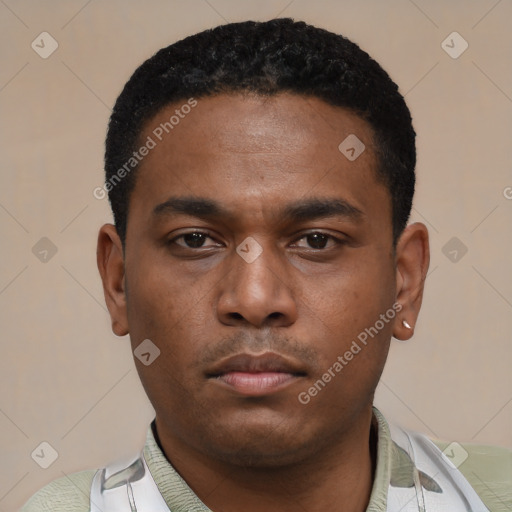 Neutral latino young-adult male with short  black hair and brown eyes