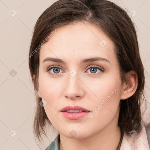 Neutral white young-adult female with medium  brown hair and grey eyes