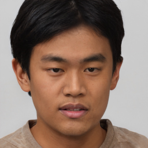 Neutral asian young-adult male with short  black hair and brown eyes