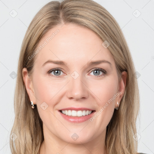 Joyful white young-adult female with long  brown hair and grey eyes