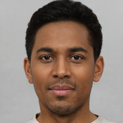 Neutral black young-adult male with short  black hair and brown eyes