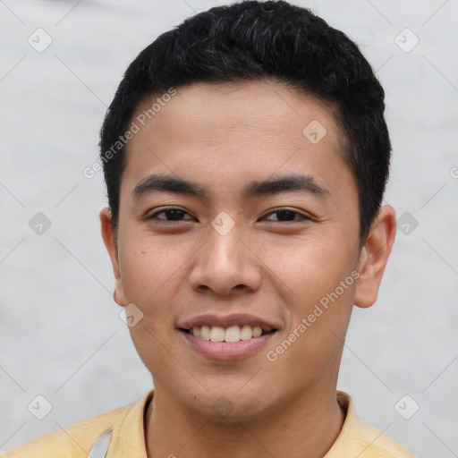 Joyful latino young-adult male with short  brown hair and brown eyes