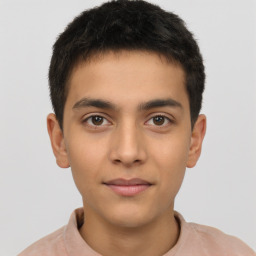 Joyful latino young-adult male with short  brown hair and brown eyes