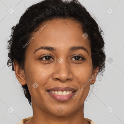 Joyful latino adult female with short  brown hair and brown eyes