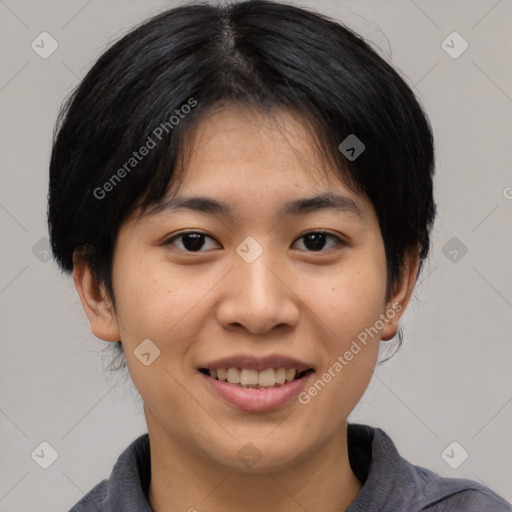 Joyful asian young-adult female with medium  black hair and brown eyes