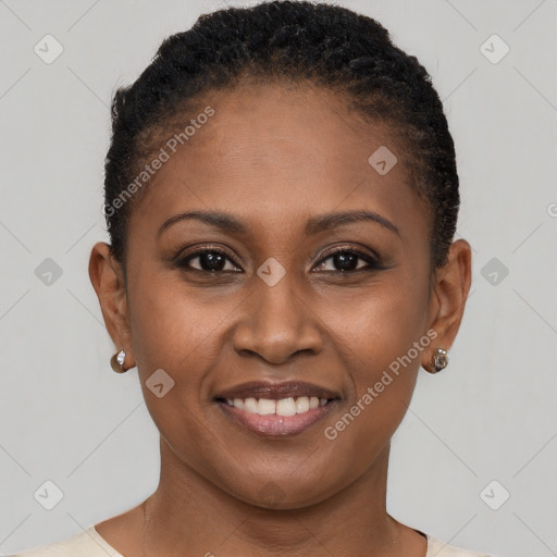 Joyful black young-adult female with short  brown hair and brown eyes