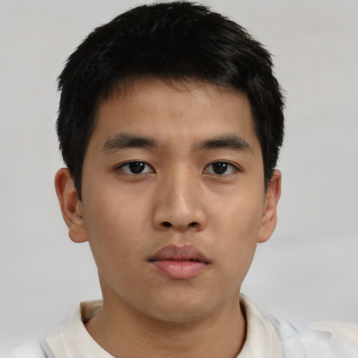 Neutral asian young-adult male with short  black hair and brown eyes