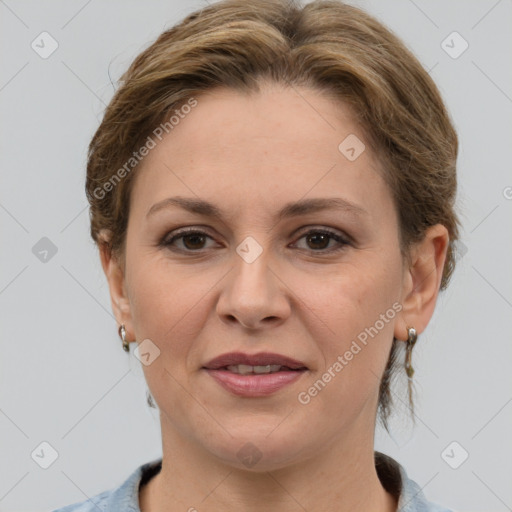 Joyful white adult female with medium  brown hair and grey eyes