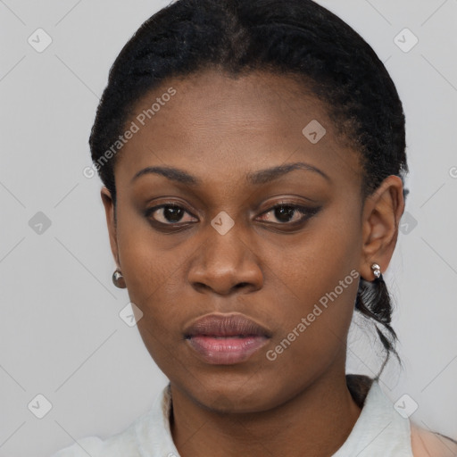 Neutral black young-adult female with short  black hair and brown eyes