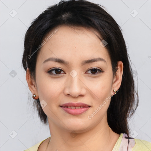 Joyful asian young-adult female with medium  black hair and brown eyes