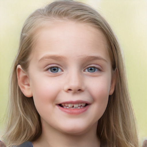 Joyful white child female with long  brown hair and blue eyes