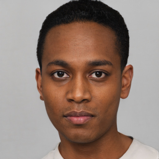 Neutral black young-adult male with short  black hair and brown eyes