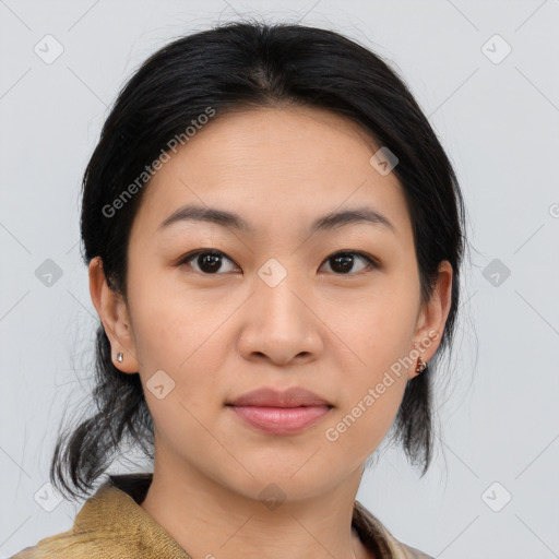 Joyful asian young-adult female with medium  brown hair and brown eyes