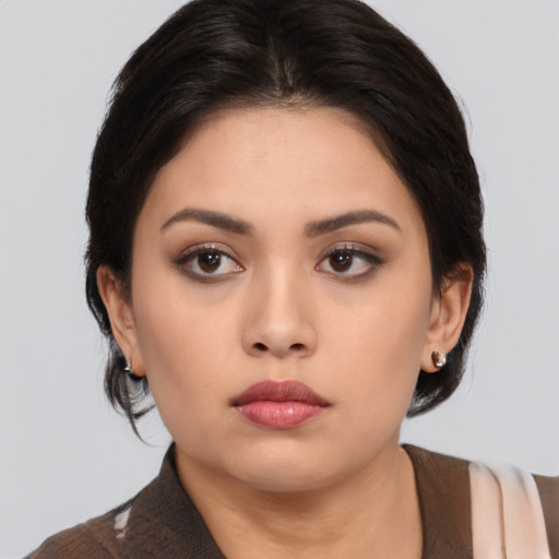 Neutral asian young-adult female with medium  black hair and brown eyes