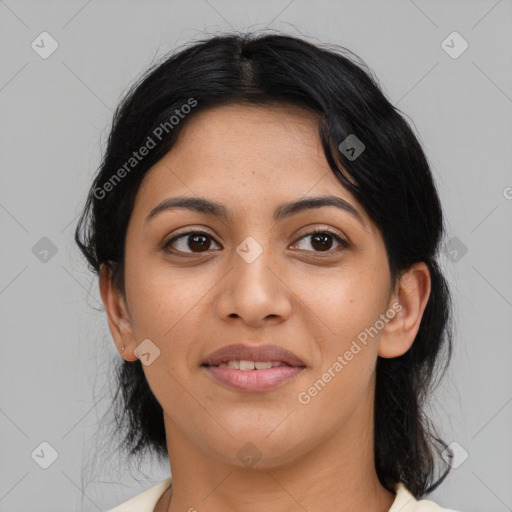 Joyful latino young-adult female with medium  black hair and brown eyes