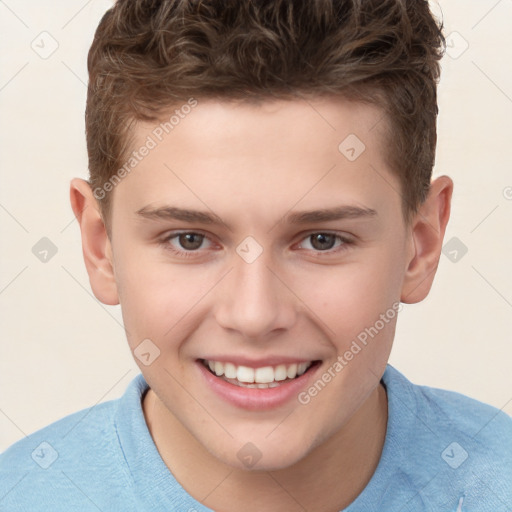 Joyful white child male with short  brown hair and brown eyes