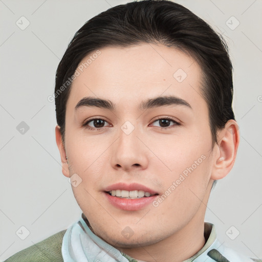 Joyful white young-adult male with short  brown hair and brown eyes