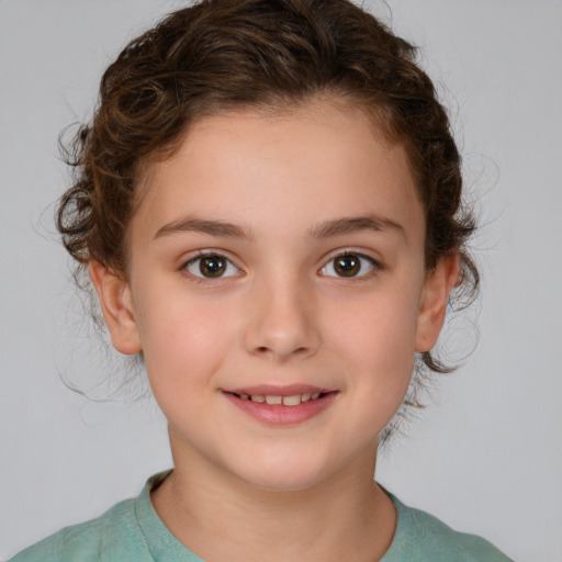 Joyful white child female with medium  brown hair and brown eyes