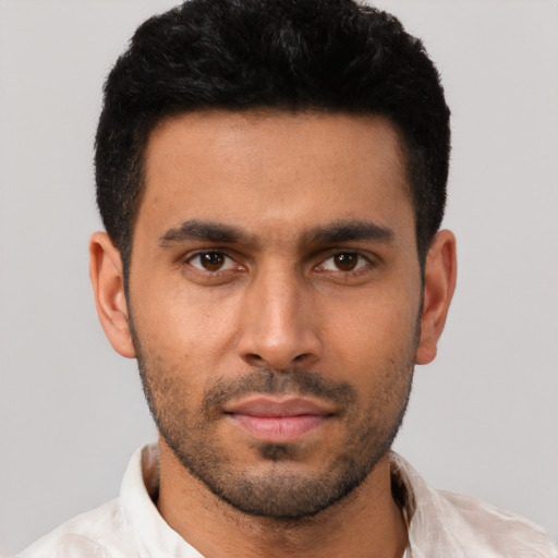 Neutral white young-adult male with short  black hair and brown eyes