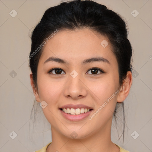 Joyful asian young-adult female with medium  brown hair and brown eyes