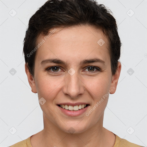 Joyful white young-adult female with short  brown hair and grey eyes