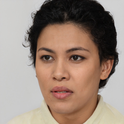 Neutral latino young-adult female with short  brown hair and brown eyes