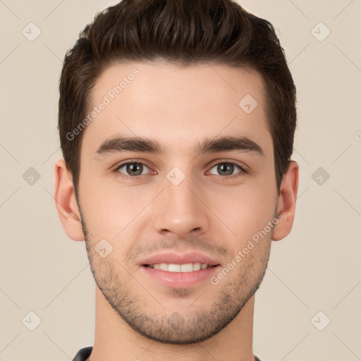 Joyful white young-adult male with short  brown hair and brown eyes