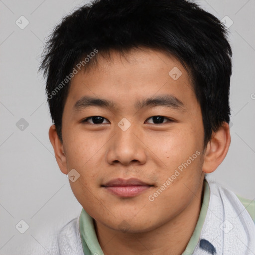 Joyful asian young-adult male with short  black hair and brown eyes