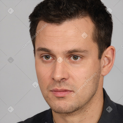 Neutral white young-adult male with short  brown hair and brown eyes