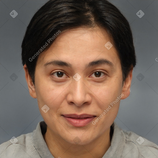 Joyful white adult female with short  brown hair and brown eyes