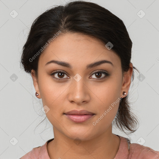 Joyful latino young-adult female with medium  brown hair and brown eyes