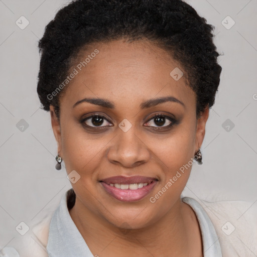 Joyful black young-adult female with short  brown hair and brown eyes