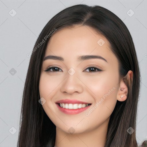 Joyful white young-adult female with long  black hair and brown eyes