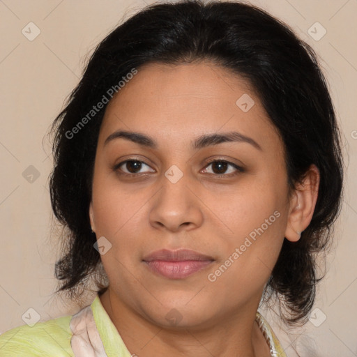 Joyful latino young-adult female with medium  brown hair and brown eyes