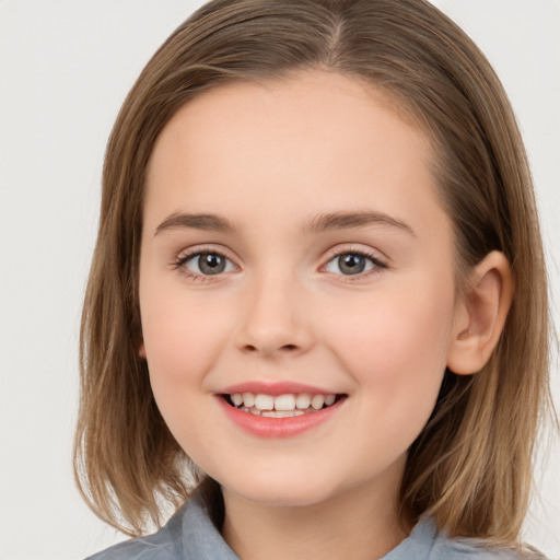 Joyful white child female with medium  brown hair and brown eyes