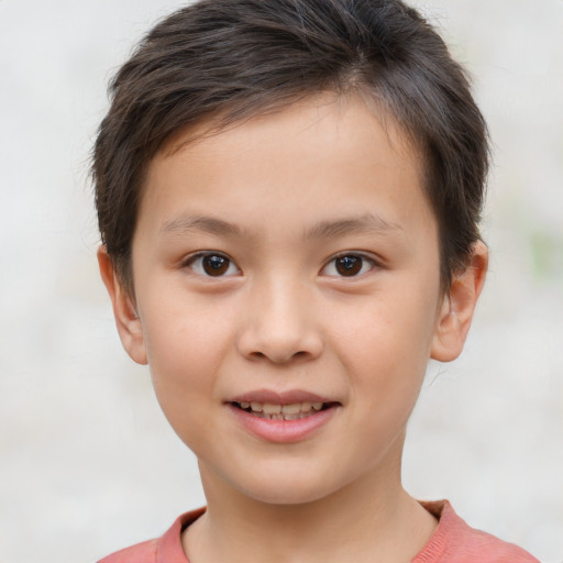 Joyful white child female with short  brown hair and brown eyes