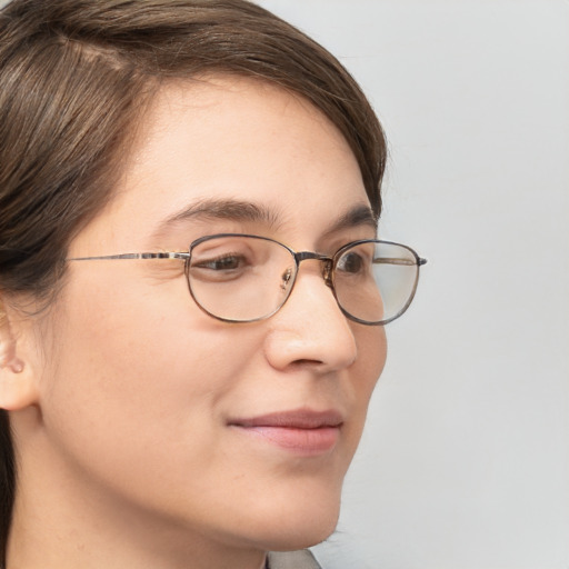 Neutral white young-adult female with short  brown hair and brown eyes