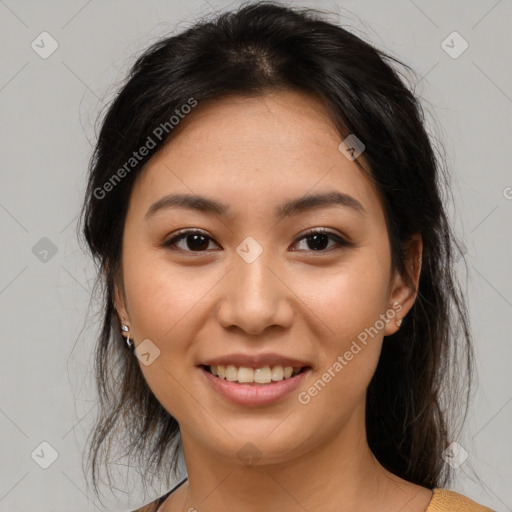 Joyful asian young-adult female with medium  brown hair and brown eyes