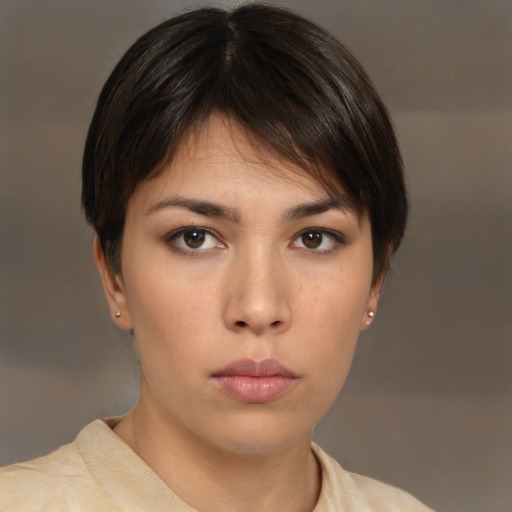 Neutral white young-adult female with short  brown hair and brown eyes